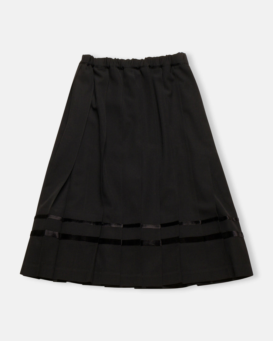 pleated skirt with velveteen trim