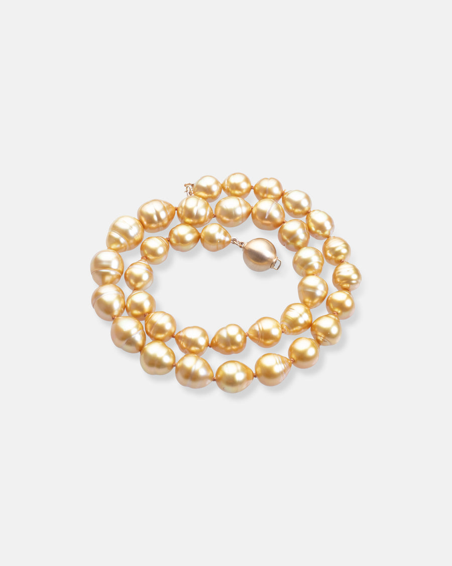 golden circled pearl necklace