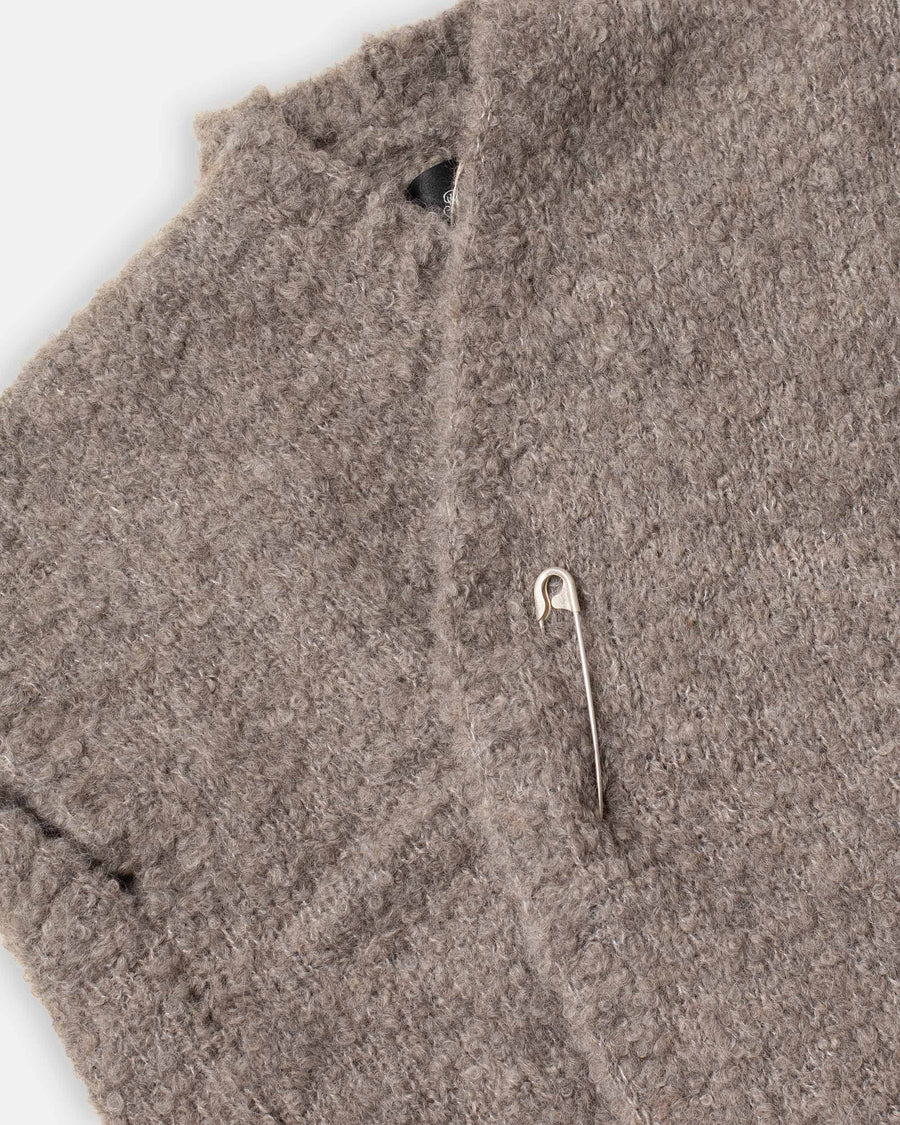 bouclé vest with pin