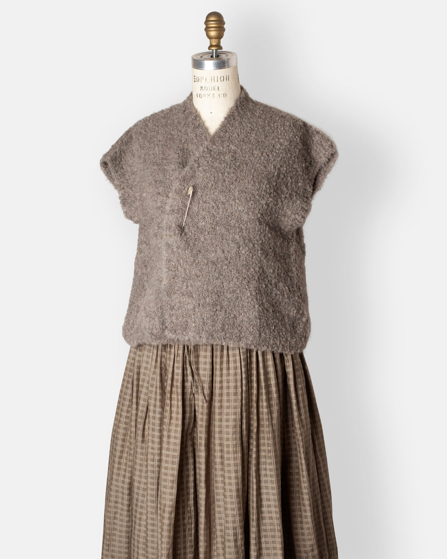 bouclé vest with pin