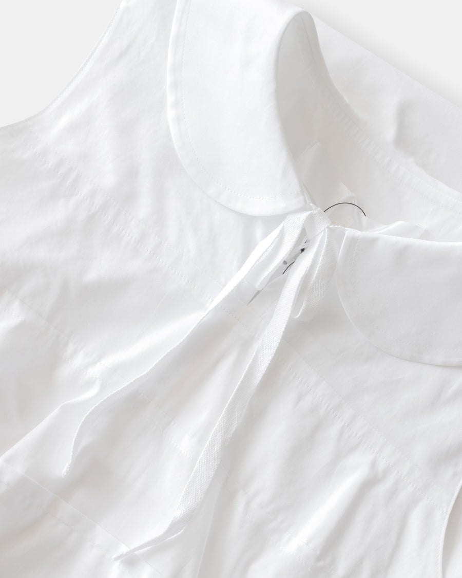 sleeveless top with peter pan collar