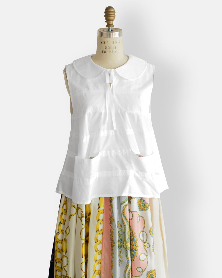 sleeveless top with peter pan collar